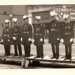 Soldiers lined up in front of the Temple Theatre, ca. 1945